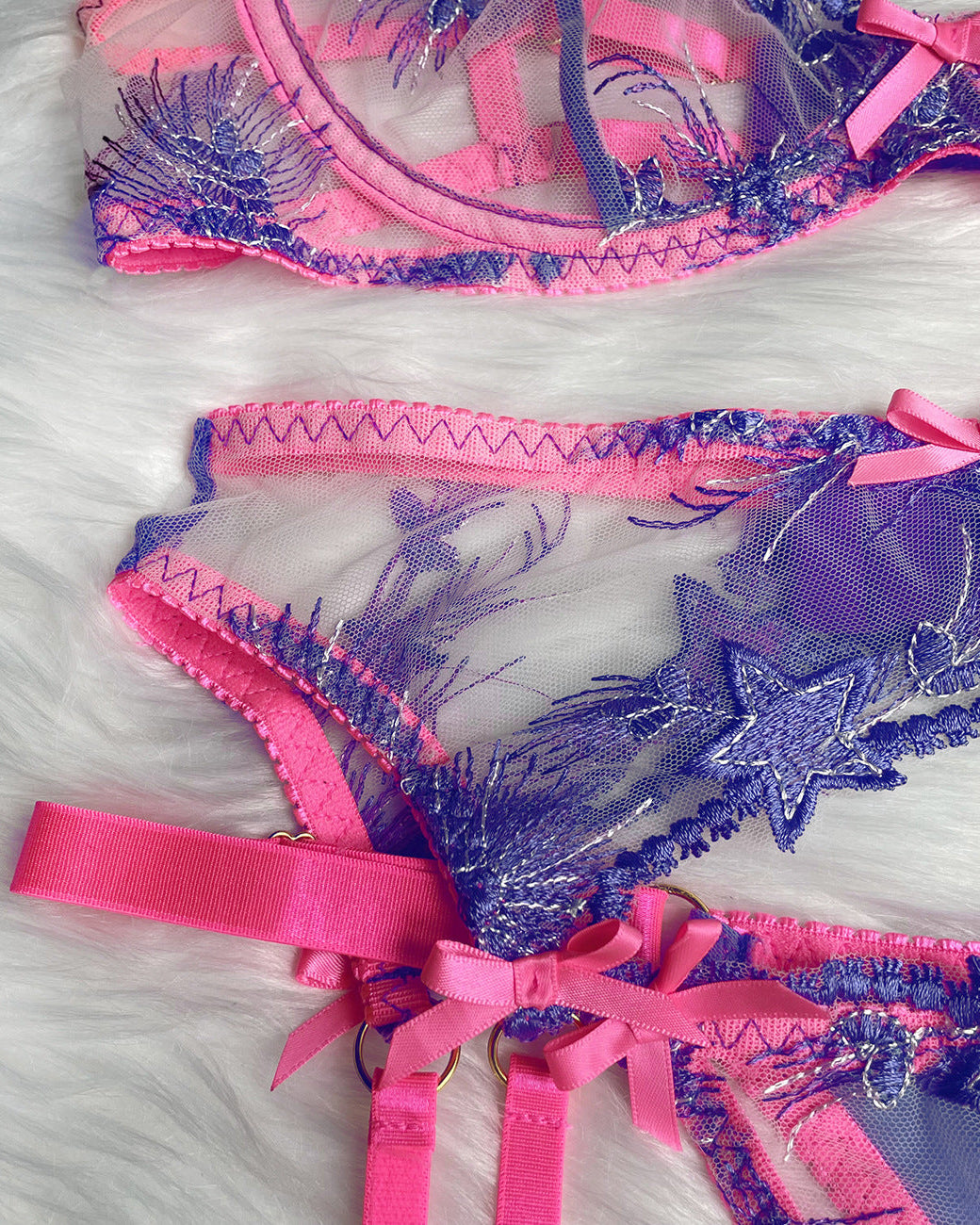 Electric Bubbleyum purple and pink lace bra, G, garter belt and garters lingerie set from The Blackmarket