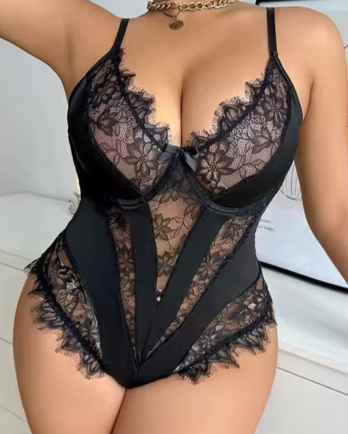 Curvy Plus Size Black Sexy bodysuit from The Blackmarket Lingerie