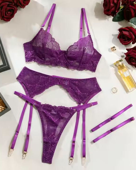 Bra, g'string, garter belt and garter set in soft purple lace from The Blackmarket Lingerie
