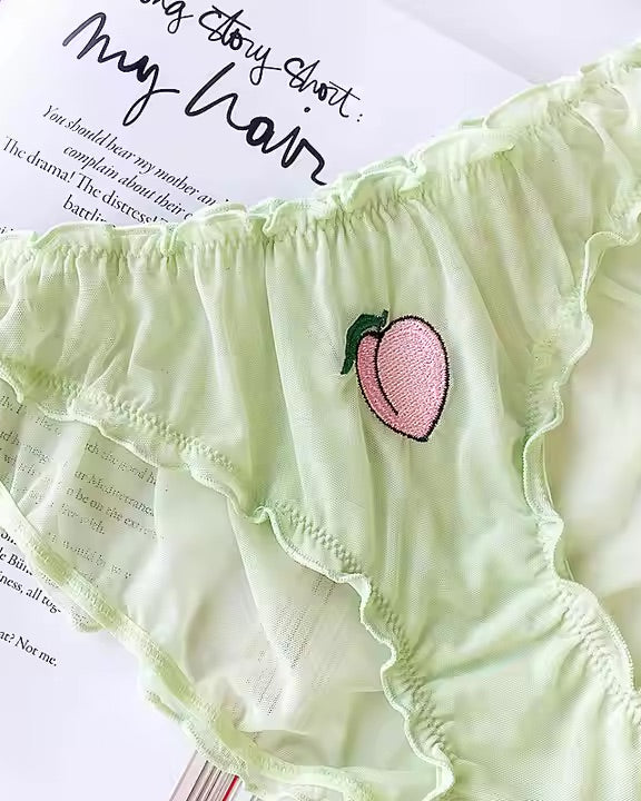 Womens underwear brief in pale green with peach motif