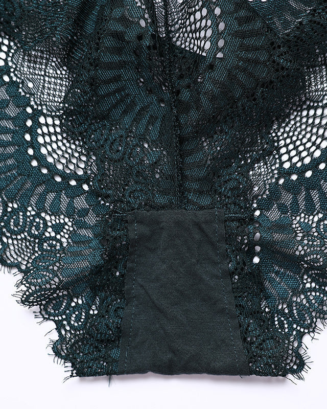 Detailed view of patterned forest green lace and lined brief gusset