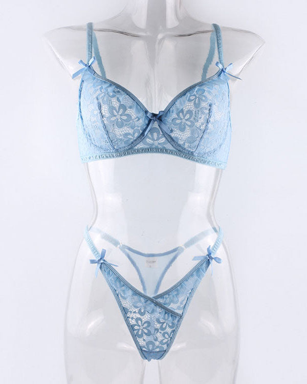 Blue lace lingerie set on a mannequin against a white background