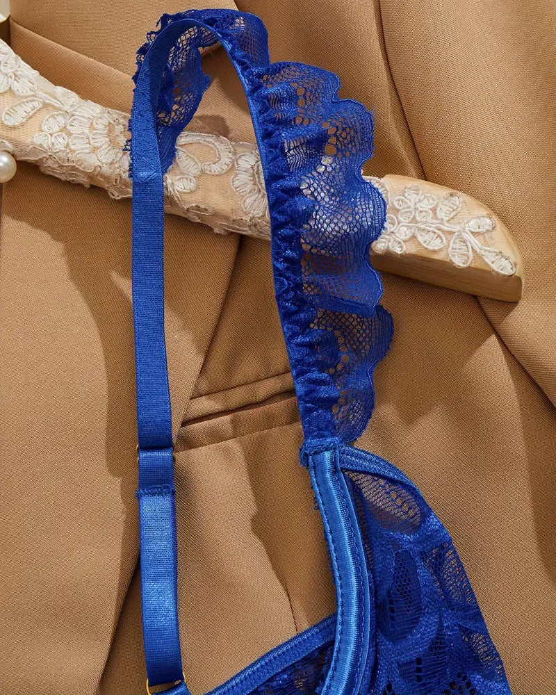 Frilled shoulder strap of the Open Invitation blue lingerie bra and gstring set.