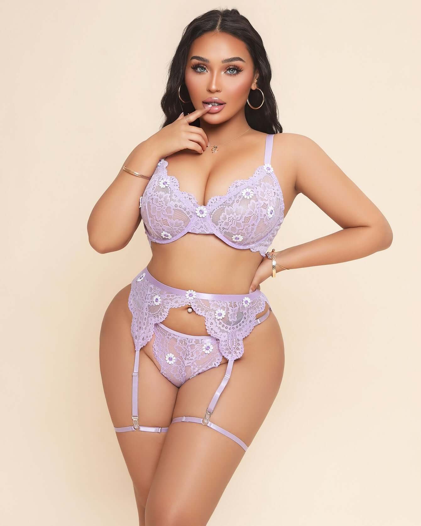 Curvy Woman wearing a lavender lace lingerie set on a beige background