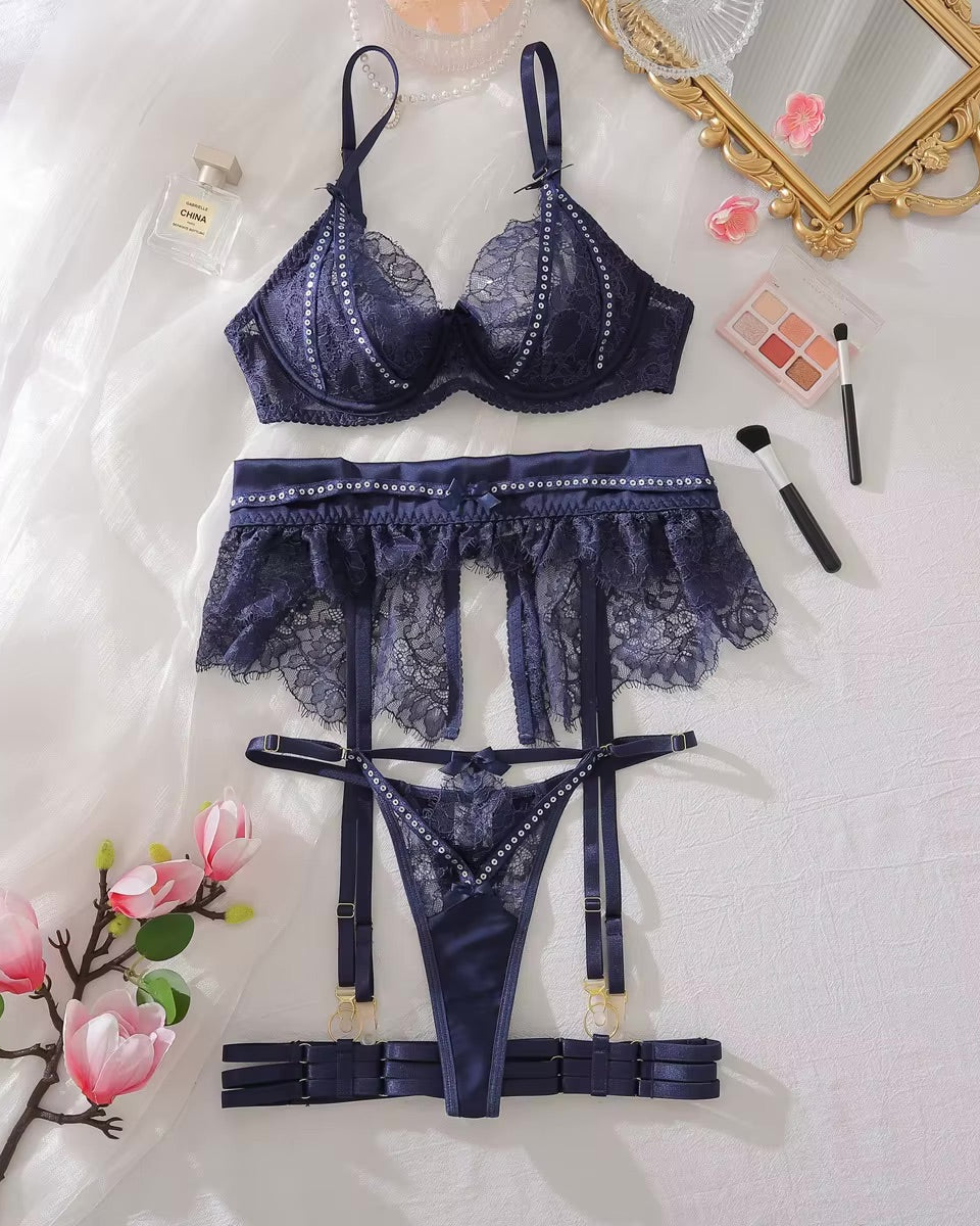 Navy sexy lingerie set from The Blackmarket Lingerie. Set includes bra, garter belt, G string and leg garters