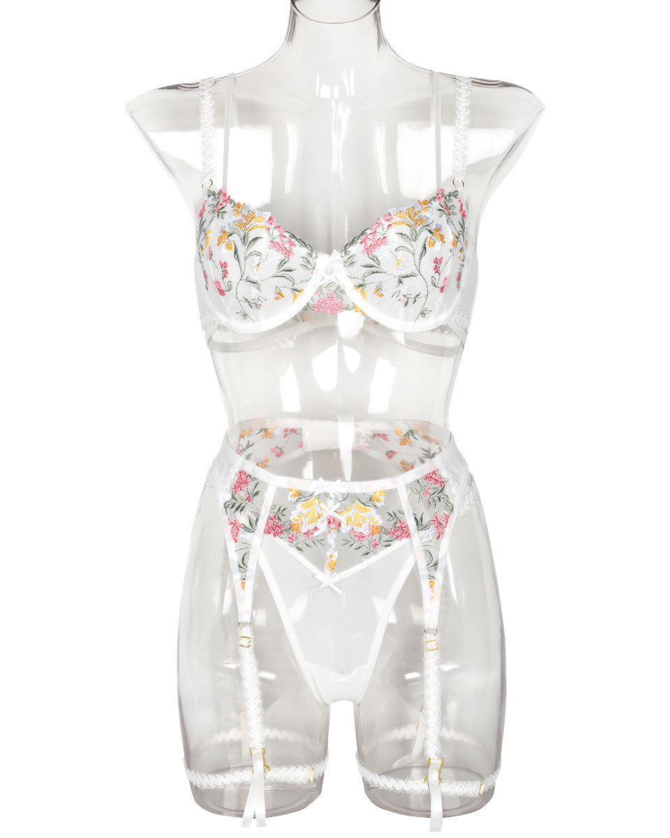 Floral lingerie set on a mannequin against a white background