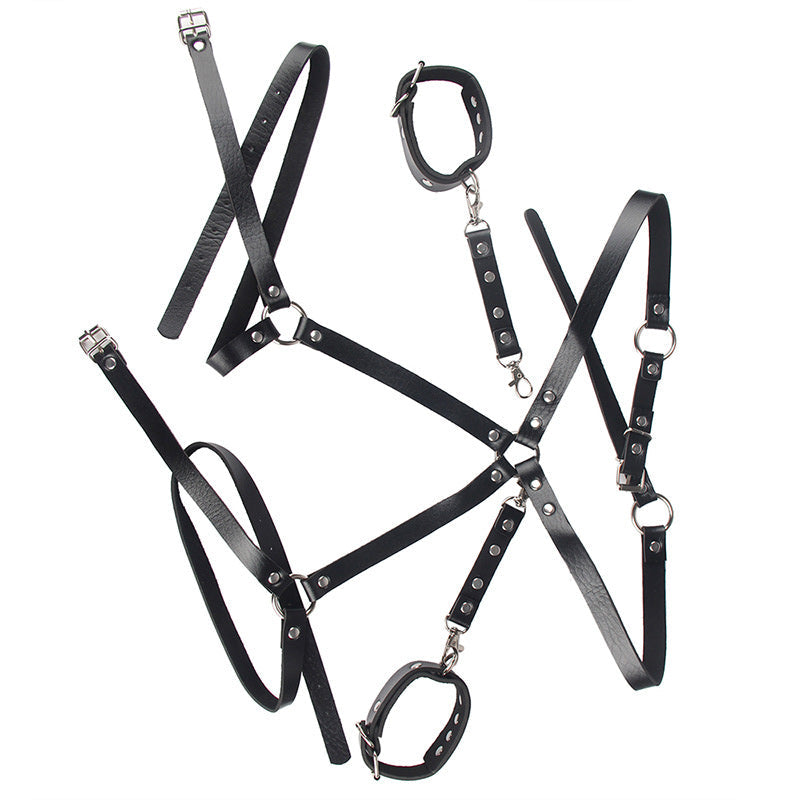 Call the Shots - Leather Harness and Cuffs - The Blackmarket Lingerie. Close-up of faux leather harness detail and silver O-ring connectors