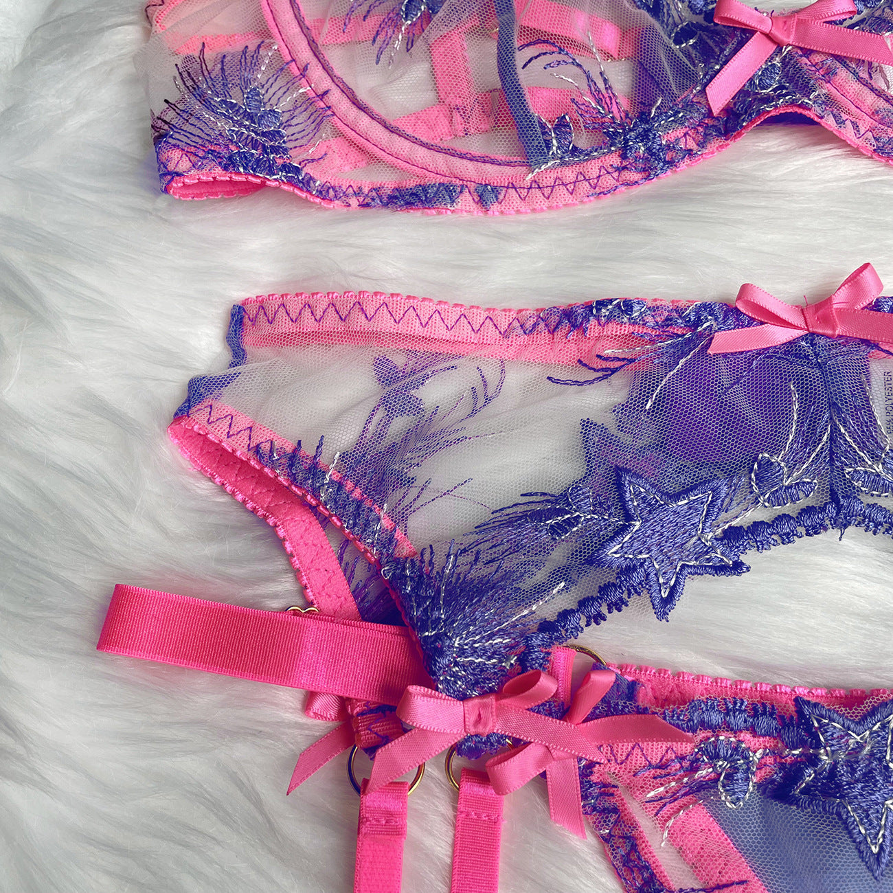 Electric Bubbleyum purple and pink lace bra, G, garter belt and garters lingerie set from The Blackmarket