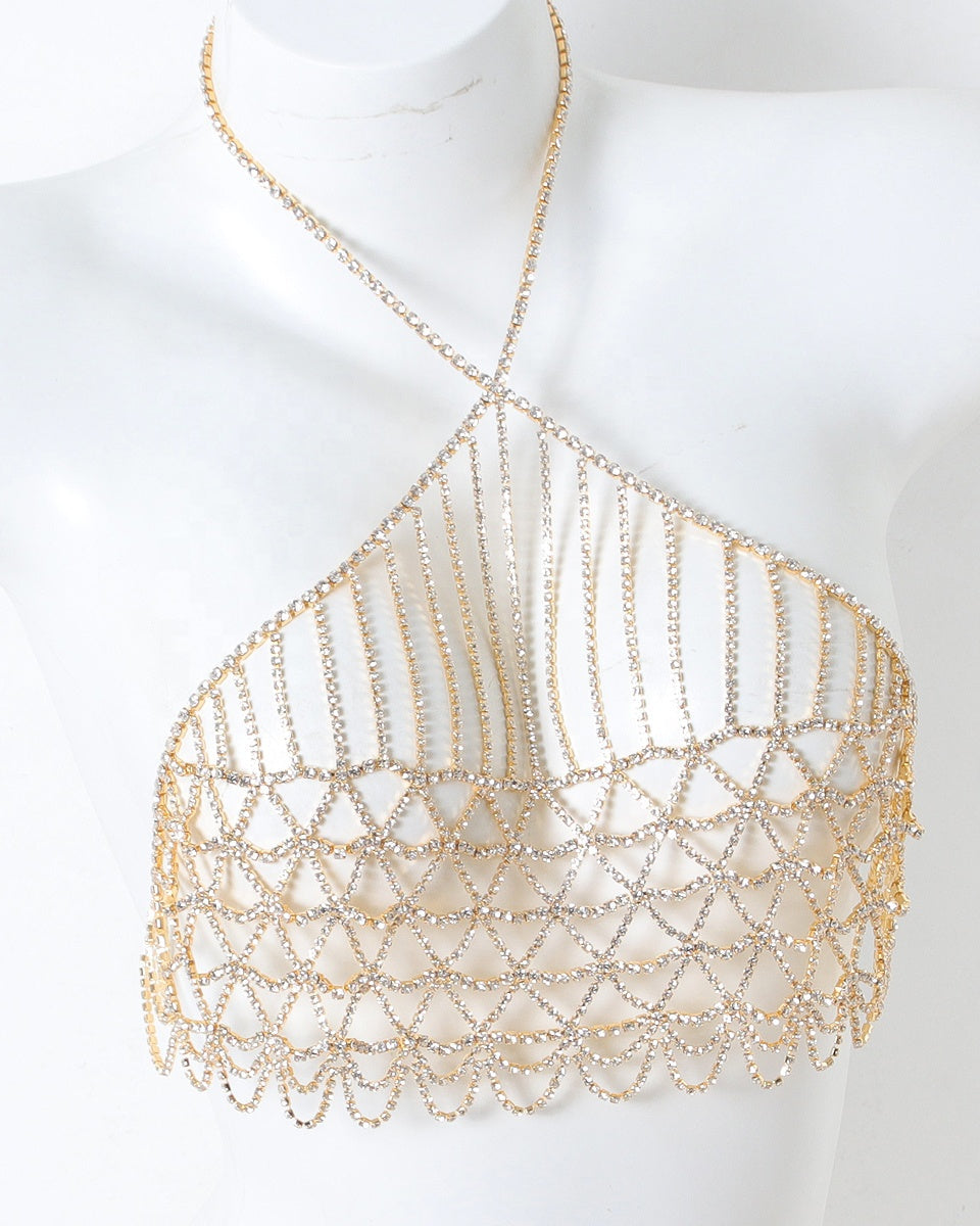 close up of gold chain lingerie halter top catching light 
