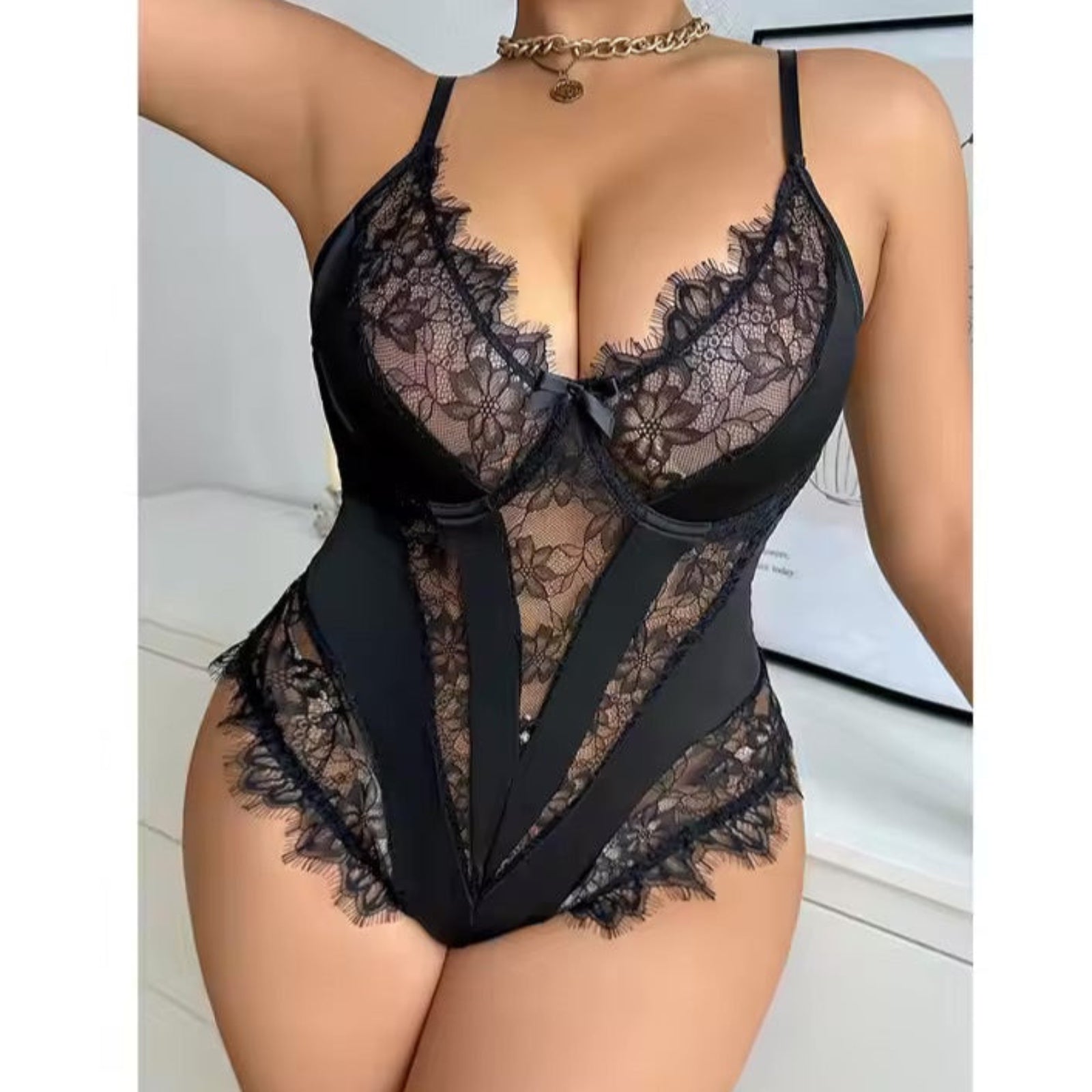 Curvy Plus Size Black Sexy bodysuit from The Blackmarket Lingerie