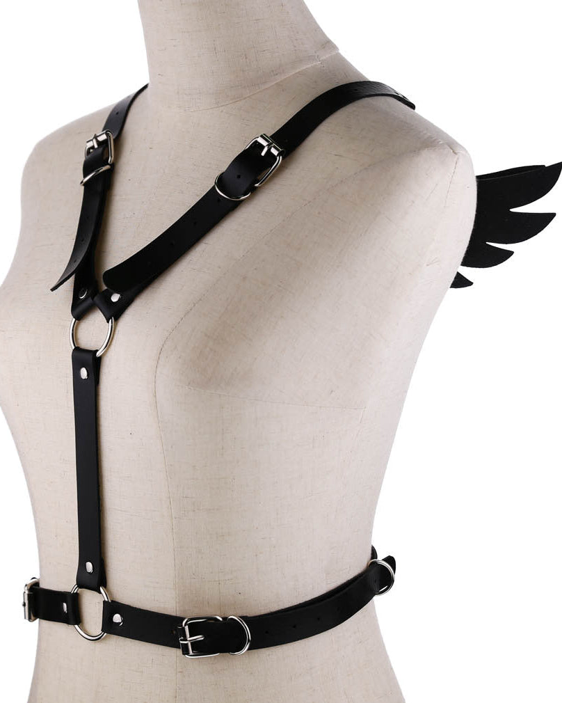 Faux leather harness with wing-shaped back detail on mannequin, front view