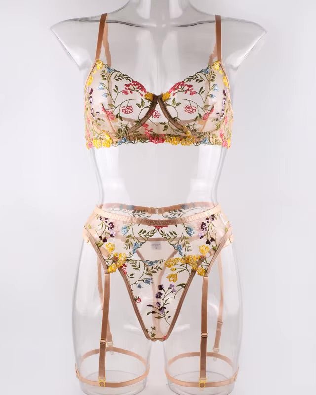 Floral lingerie set on a mannequin against a white background