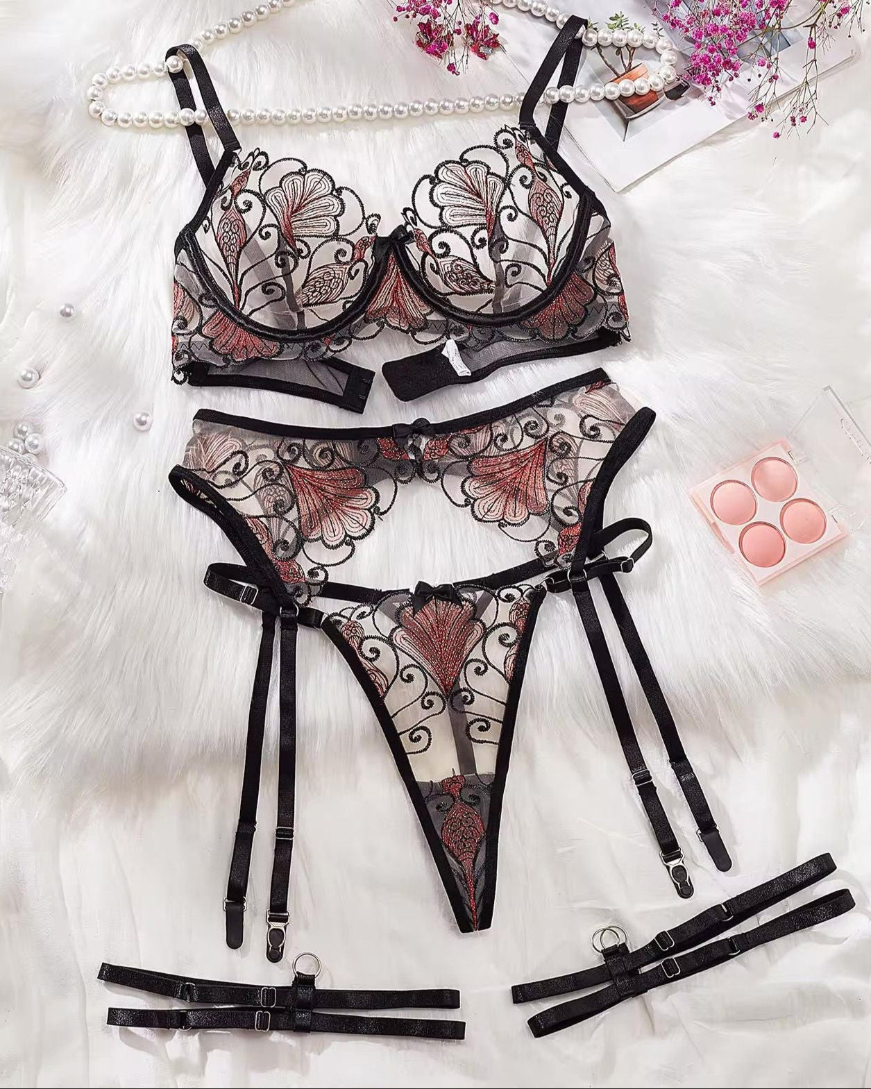 Oh Me Oh My 5-piece lingerie set with embroidered underwire bra, suspender belt, G-string and matching detachable leg straps in pink, black and nude mesh.